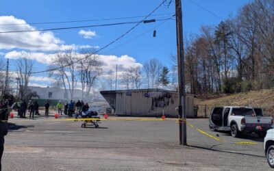 Vehicle Strikes Laundromat on Shelton Ave, Causing Fire and Partial Building Collapse
